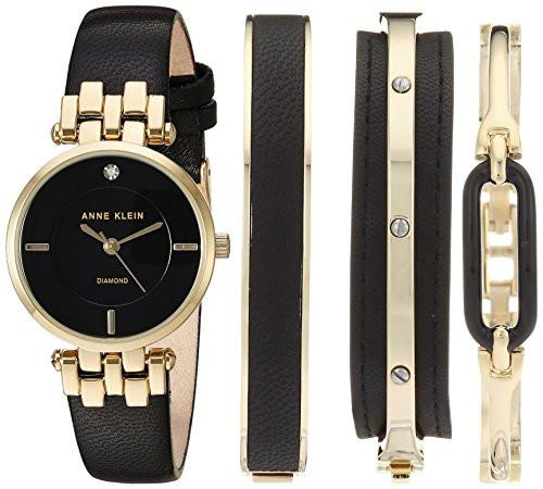 Anne Klein Women's AK/2684BKST Diamond-Accented Gold-Tone and Black Leather Strap Watch and Bangle Set